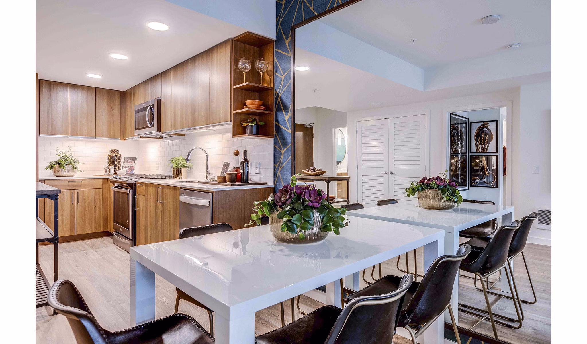 Dining room with elegant decor and modern furnishings at Marlowe Apartments