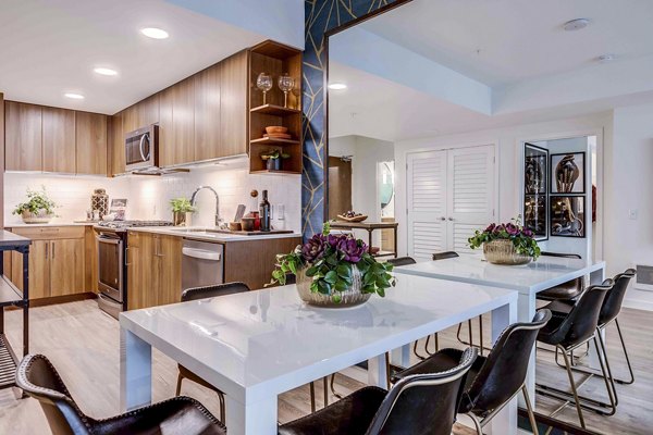 Dining room with elegant decor and modern furnishings at Marlowe Apartments