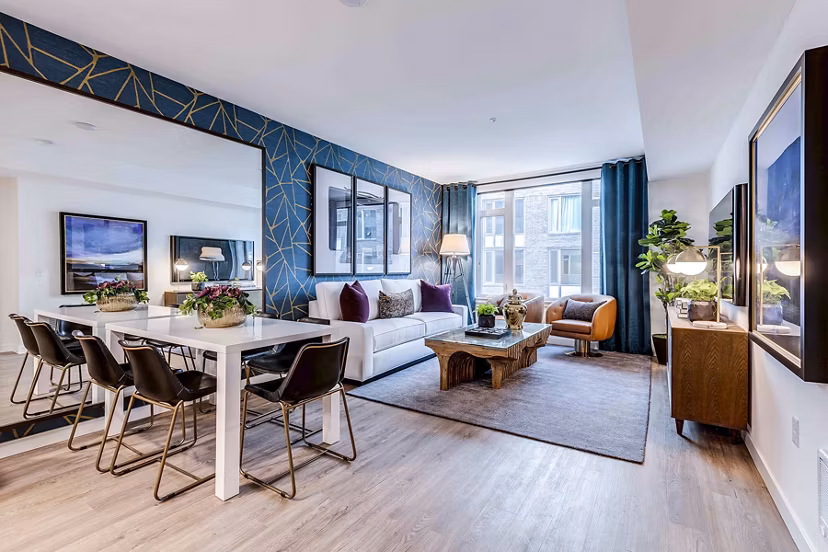 Dining room with modern decor and pendant lighting at Marlowe Apartments, a luxury property by Greystar