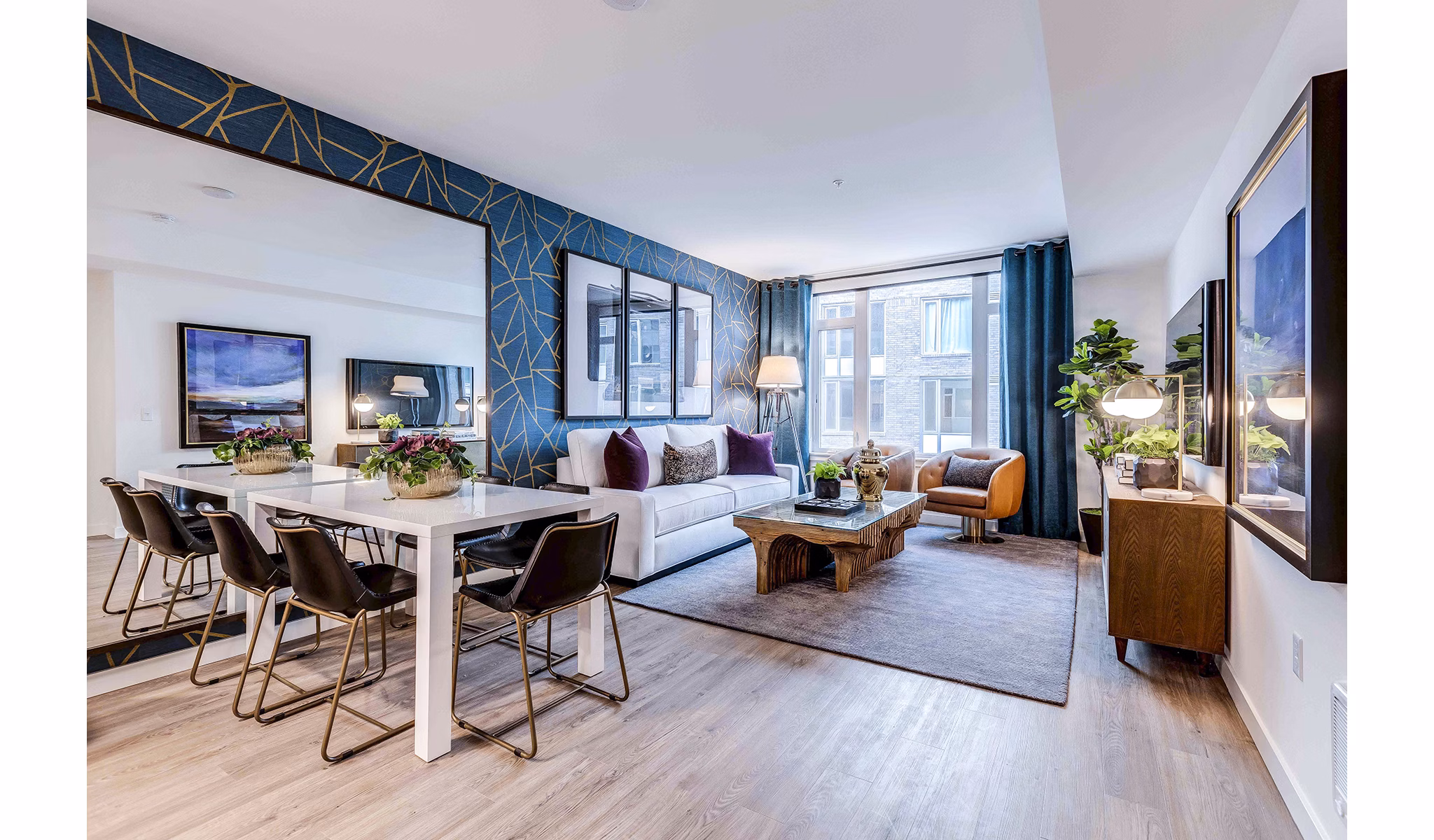 Dining room with modern decor and pendant lighting at Marlowe Apartments, a luxury property by Greystar