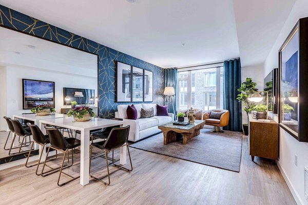 Dining room with modern decor and pendant lighting at Marlowe Apartments, a luxury property by Greystar