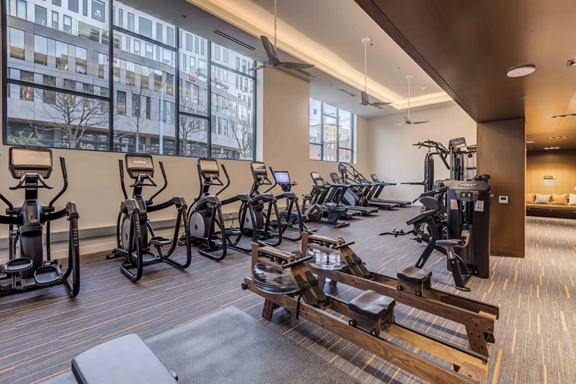 State-of-the-art fitness center equipped with modern workout machines at Marlowe Apartments