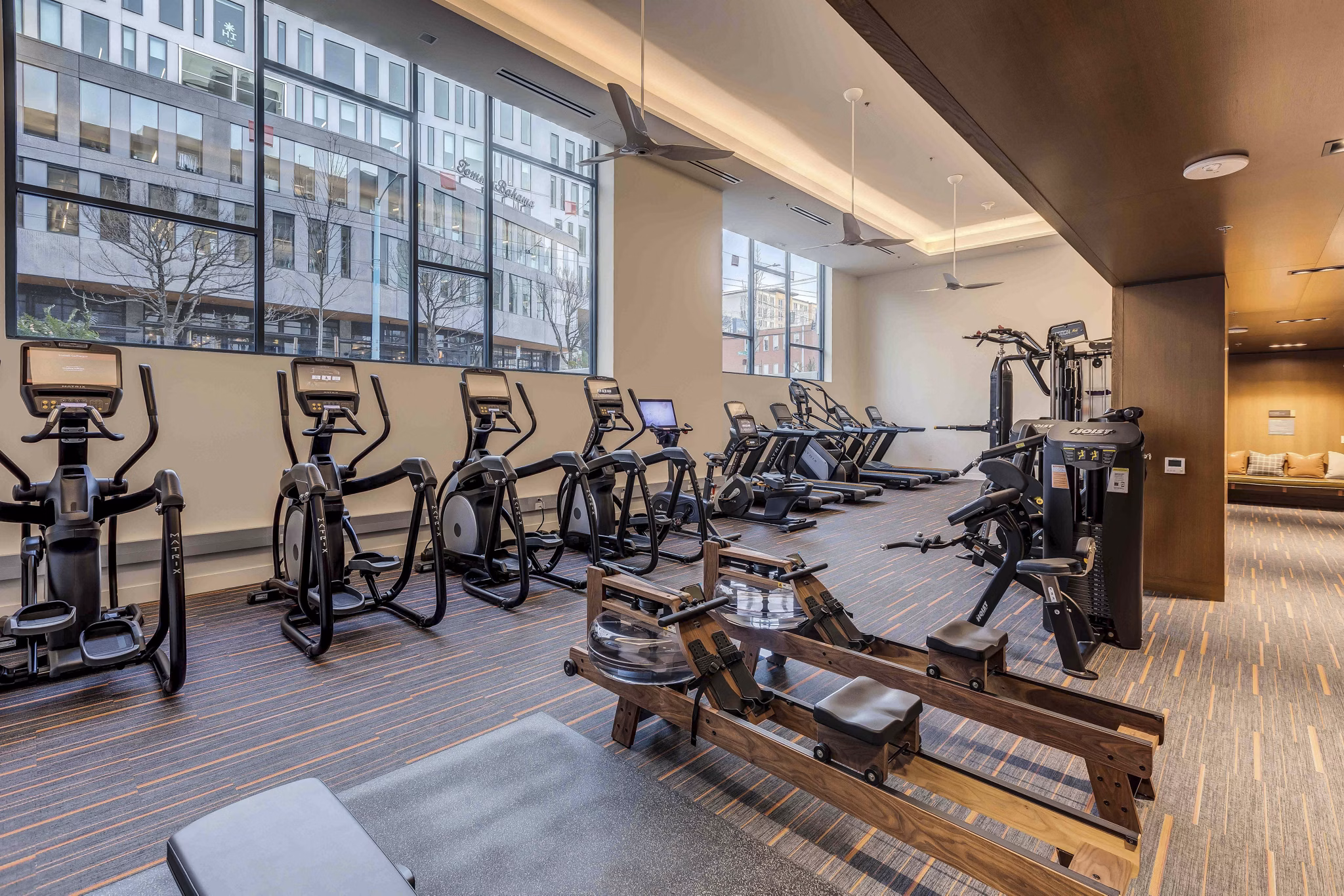 State-of-the-art fitness center equipped with modern workout machines at Marlowe Apartments