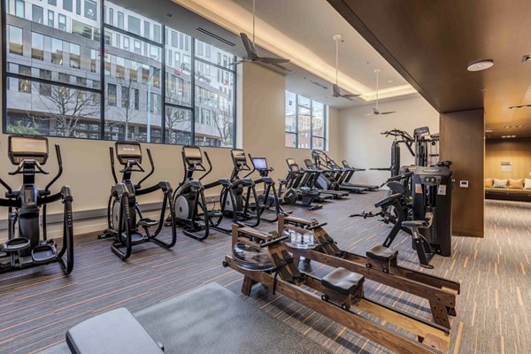 State-of-the-art fitness center equipped with modern workout machines at Marlowe Apartments