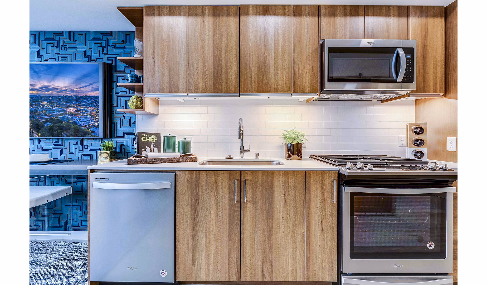 Modern kitchen with stainless steel appliances at Marlowe Apartments