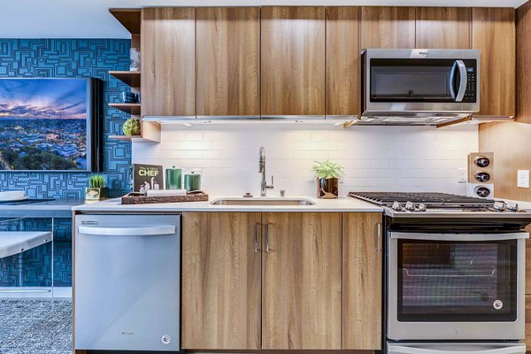 Modern kitchen with stainless steel appliances at Marlowe Apartments