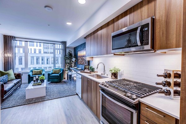 Modern kitchen with stainless steel appliances at Marlowe Apartments