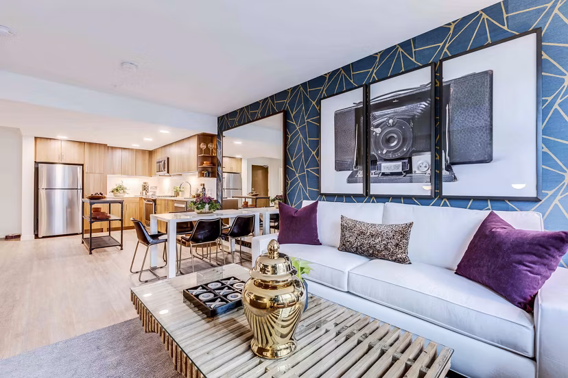 Cozy living room with modern dÃ©cor and ample natural light at Marlowe Apartments