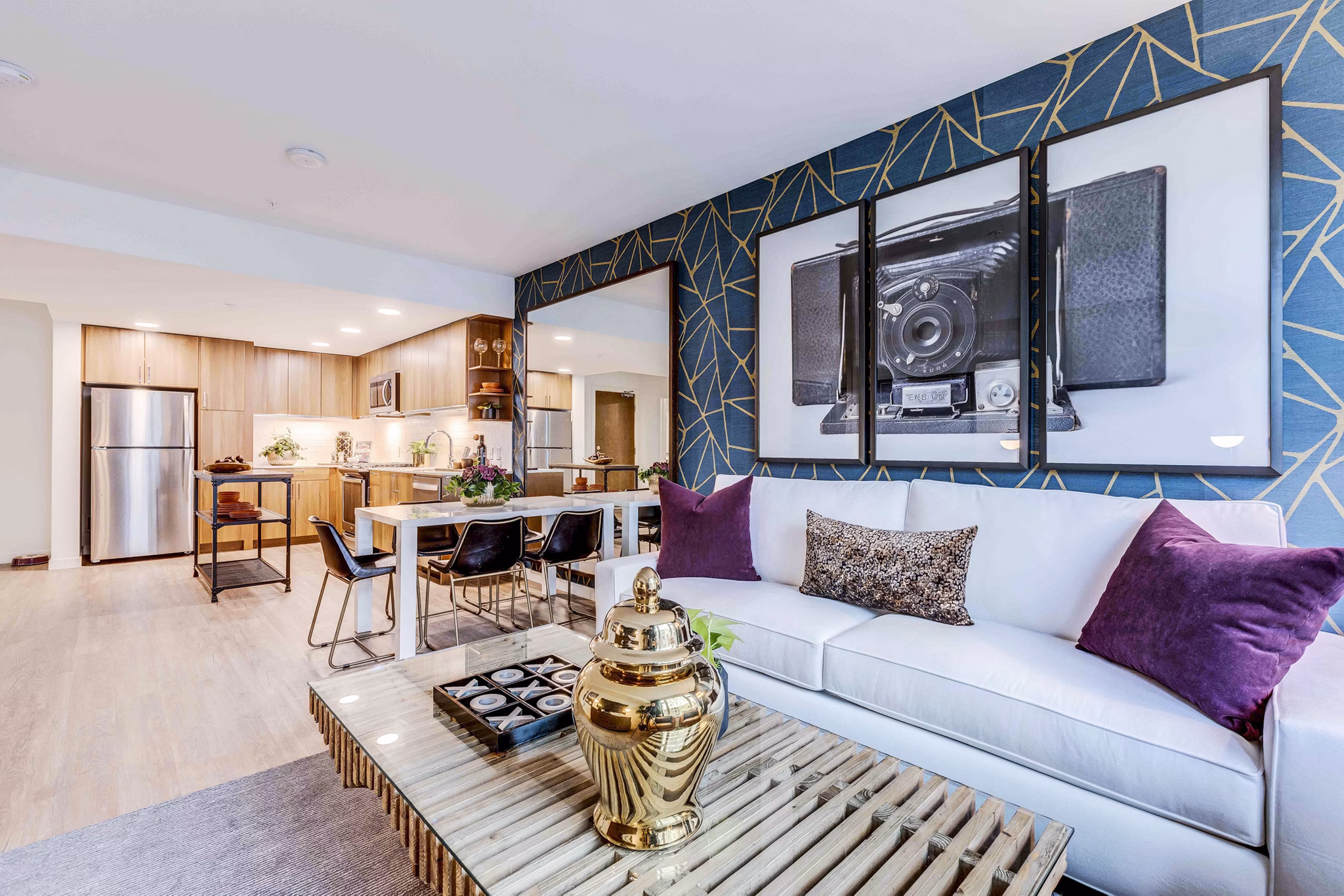 Cozy living room with modern dÃ©cor and ample natural light at Marlowe Apartments