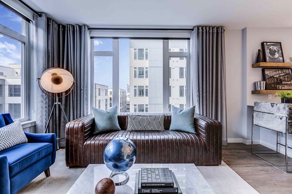 Stylish living room with modern furnishings at Marlowe Apartments