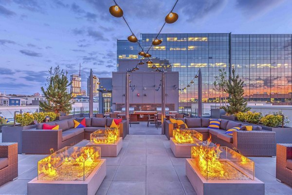 Stunning rooftop deck with city views at Marlowe Apartments, offering luxury outdoor space for residents to relax and socialize