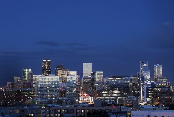 Cityscape view from high-rise balcony at Alexan LoHi Apartments in Denver