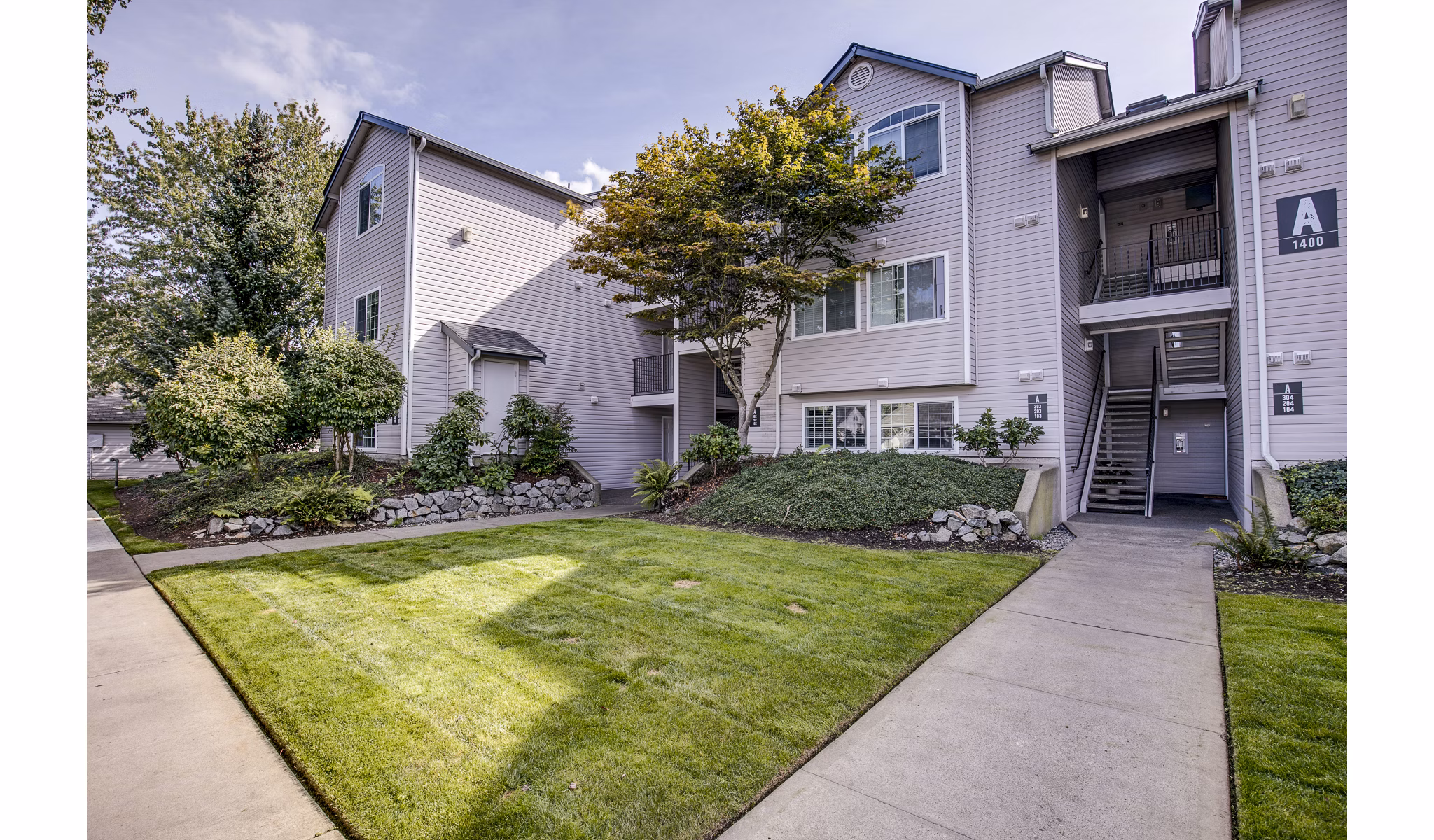 Callen Apartments: Luxury apartment building with modern design in vibrant urban setting