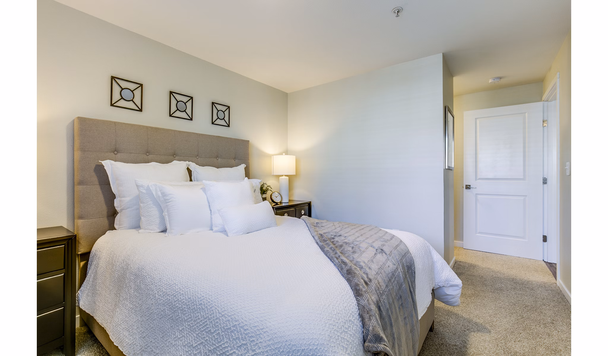 Spacious bedroom with modern decor at Callen Apartments, luxury living spaces designed for comfort and style