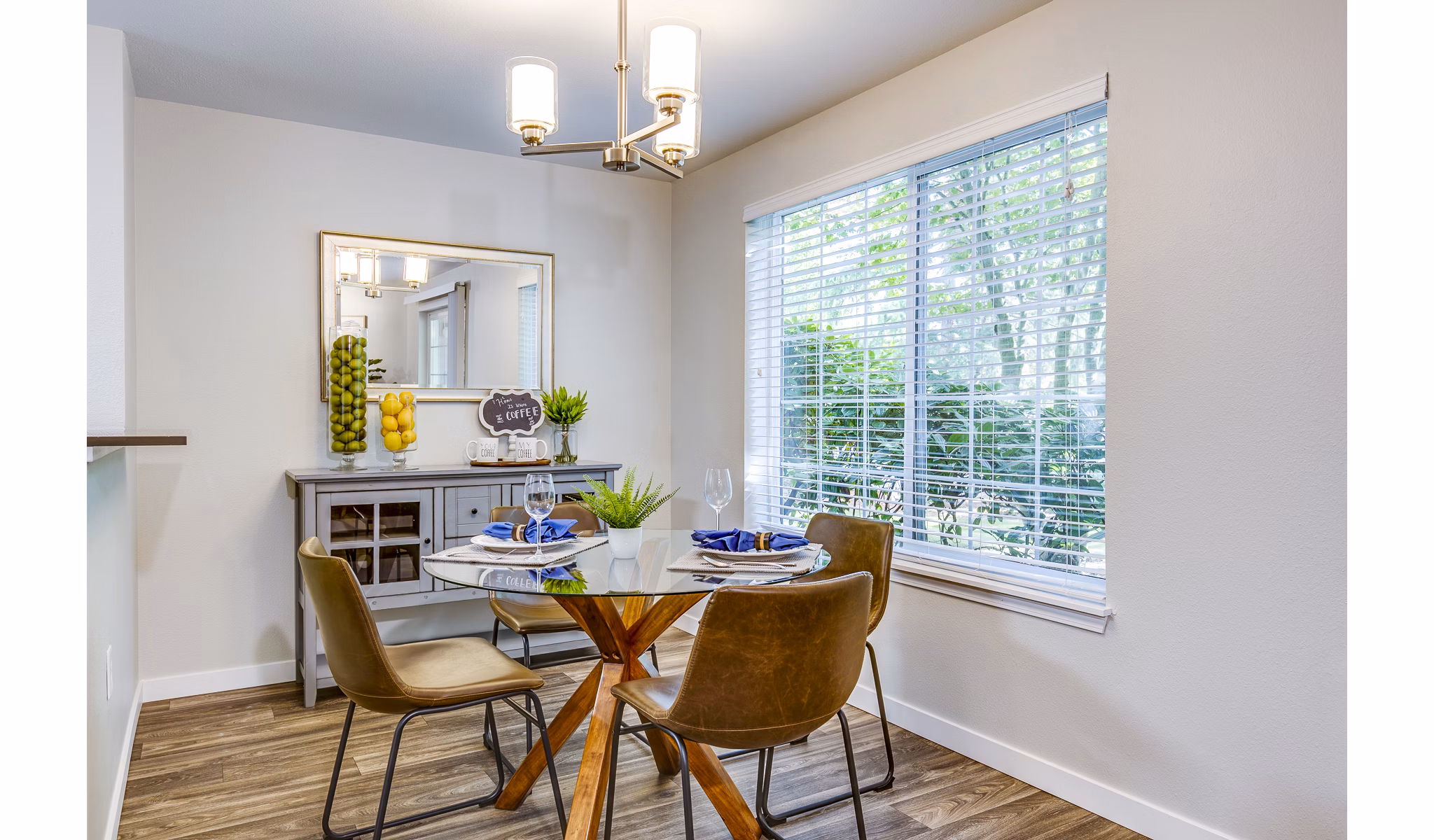 Dining room featuring modern furnishings and elegant lighting at Callen Apartments