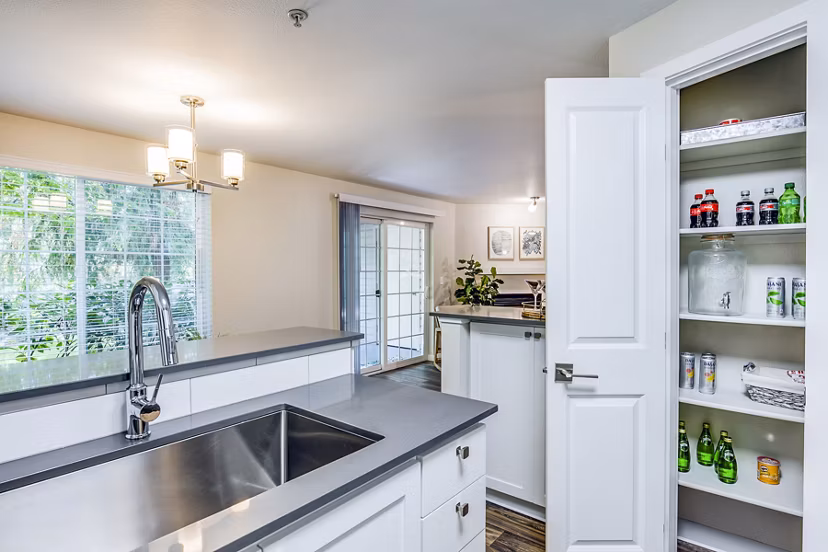 Modern kitchen with stainless steel appliances at Callen Apartments