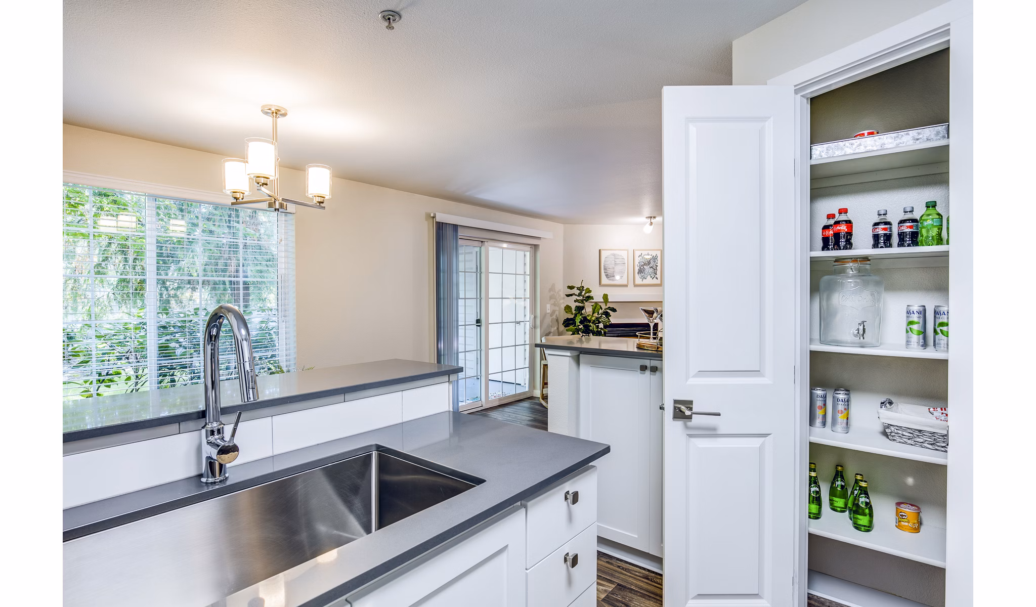 Modern kitchen with stainless steel appliances at Callen Apartments