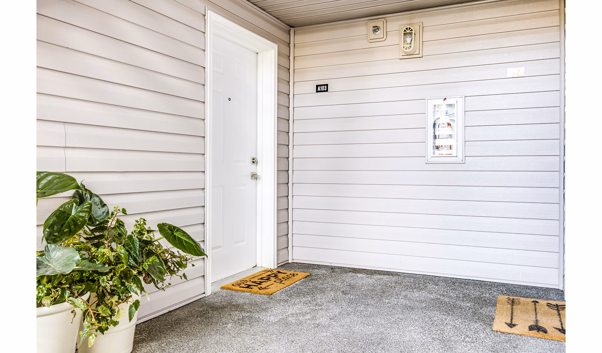 Inviting resident entrance and cozy patio at Callen Apartments, ideal for relaxing and social gatherings