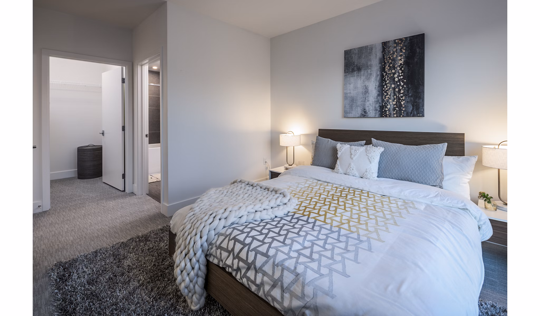 Bedroom featuring modern decor and natural light in Hyde Square Apartments