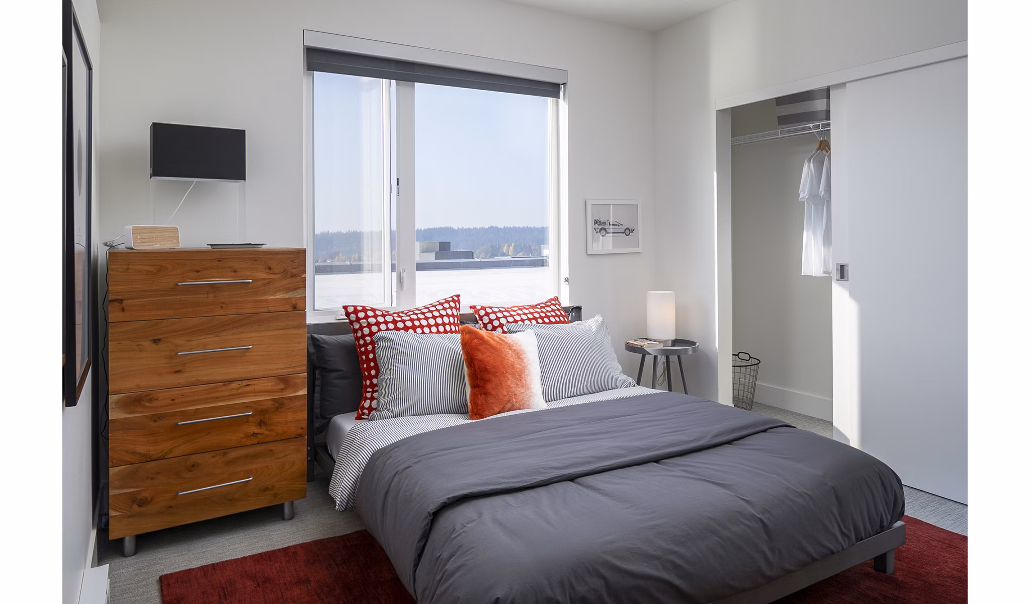 Cozy bedroom with modern decor at Hyde Square Apartments