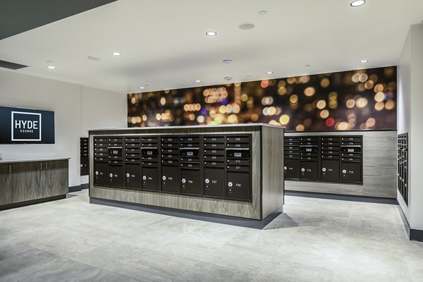 Mail room with modern design at Hyde Square Apartments