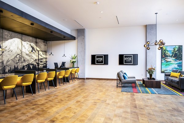 Welcoming leasing office with modern decor at Hyde Square Apartments