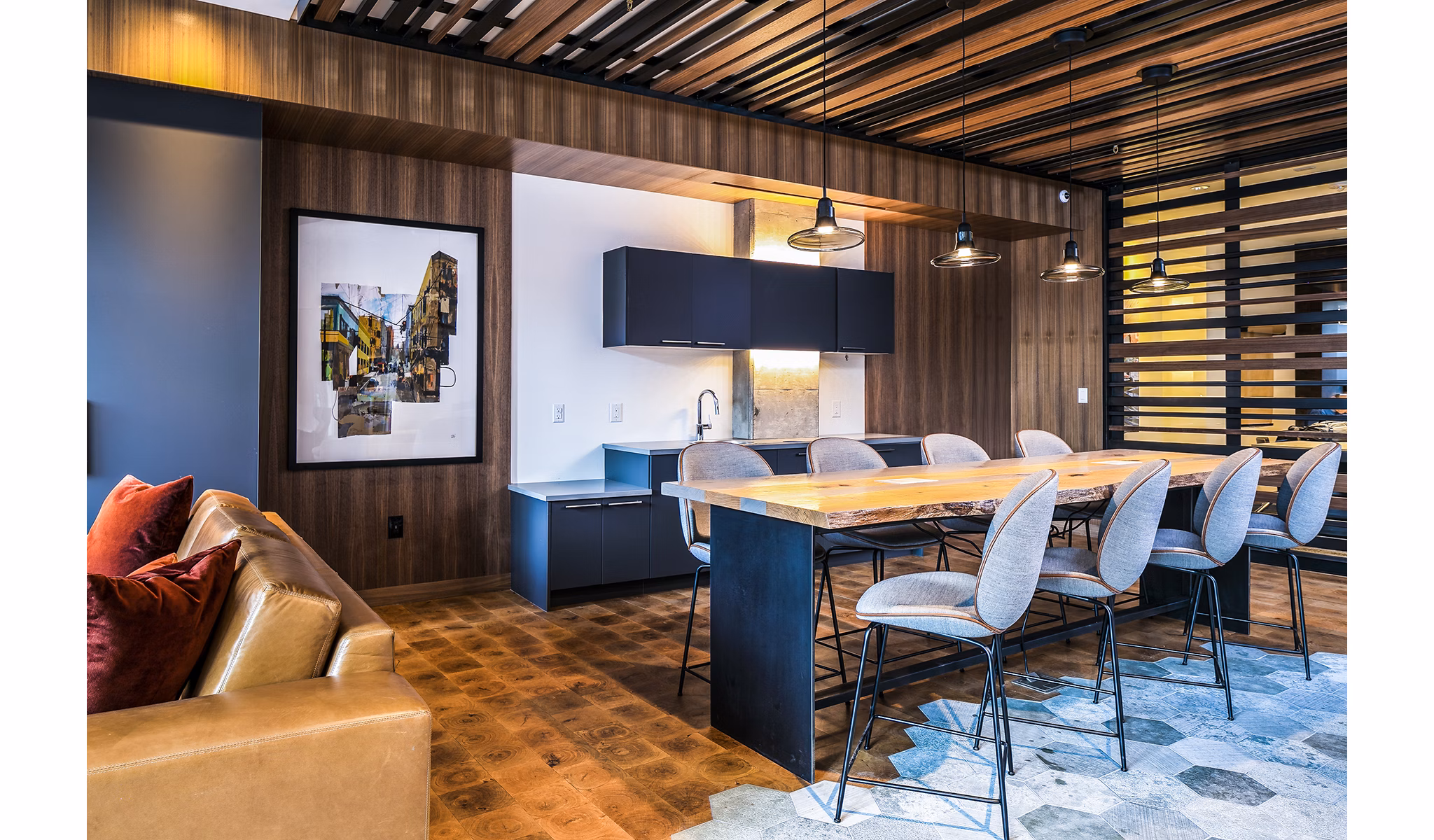 Clubhouse workspace featuring modern design and communal seating at Hyde Square Apartments