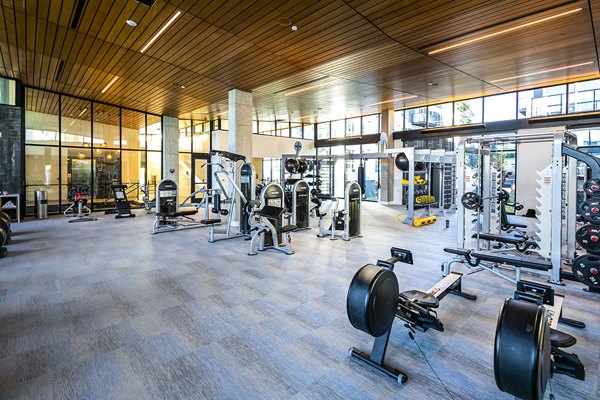 State-of-the-art fitness center featuring modern equipment at Hyde Square Apartments