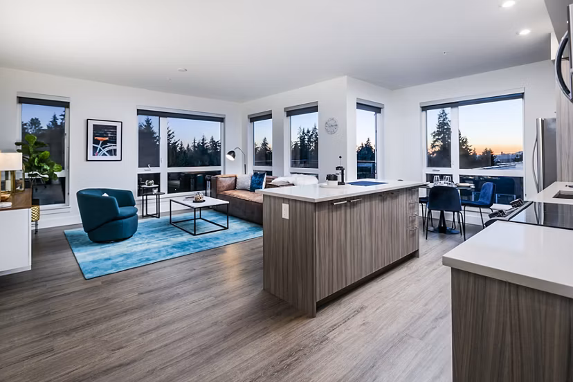 Modern kitchen with sleek countertops and stainless steel appliances at Hyde Square Apartments