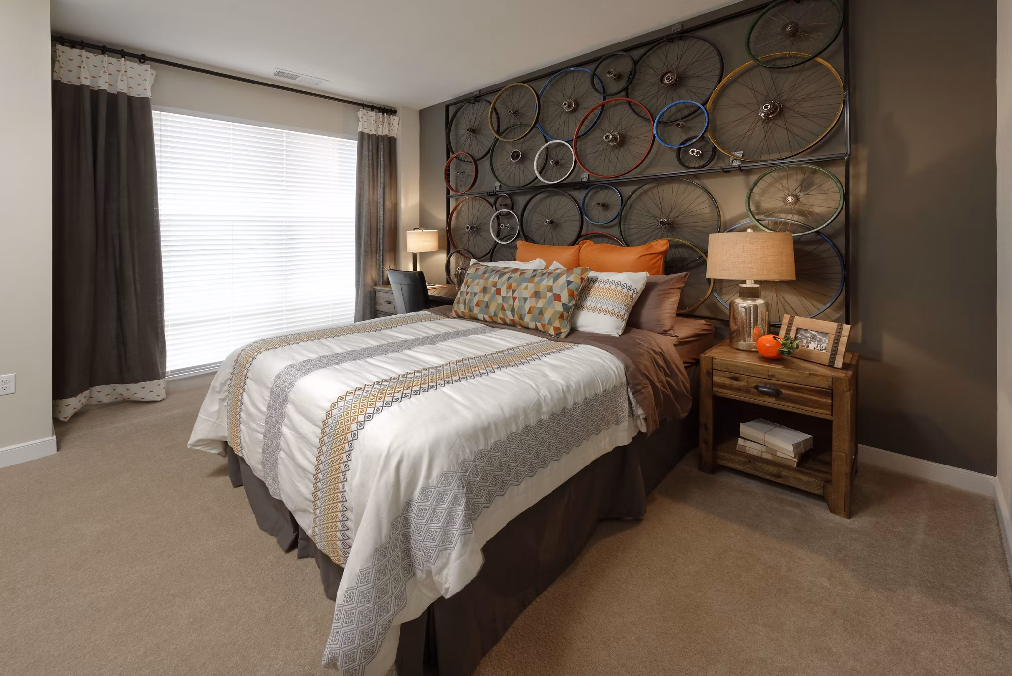 Modern bedroom with stylish decor in Station 650 Apartments