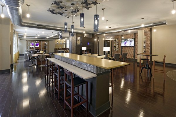 Modern clubhouse with lounge seating at Station 650 Apartments offering a luxury experience in the heart of the community