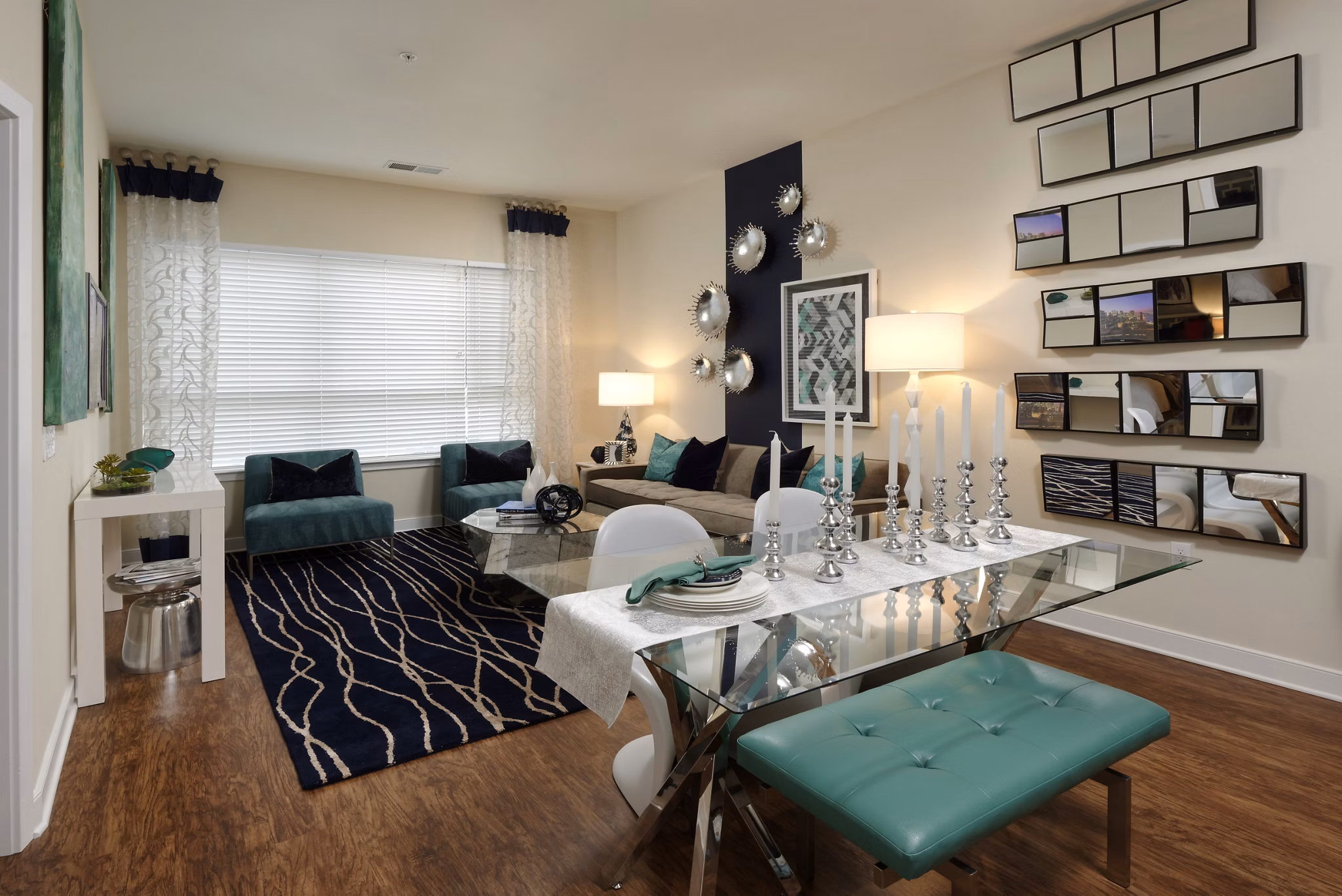 Living room featuring modern decor and plush seating in Station 650 Apartments