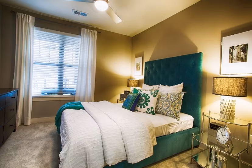 Elegant bedroom with modern decor at Marlowe Lake Boone Apartments