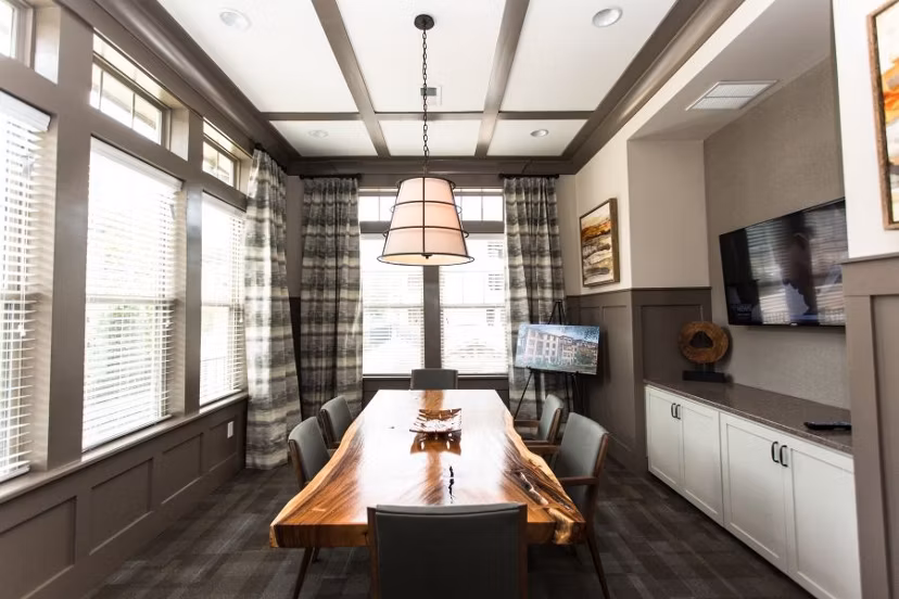 Elegant clubhouse at Marlowe Lake Boone Apartments featuring modern dÃ©cor and spacious seating areas, perfect for luxury gatherings