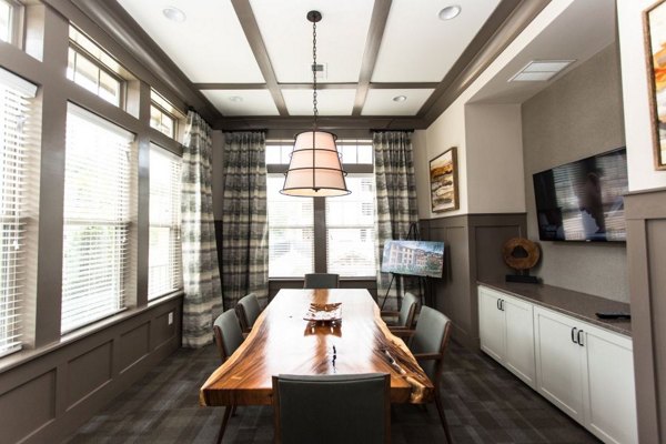 Elegant clubhouse at Marlowe Lake Boone Apartments featuring modern dÃ©cor and spacious seating areas, perfect for luxury gatherings
