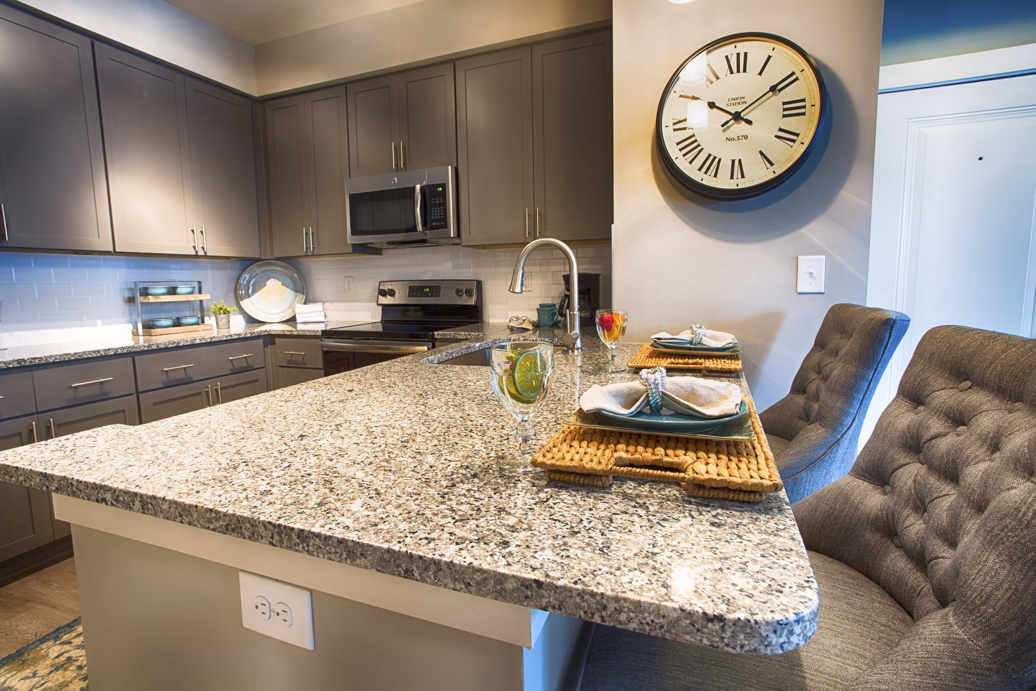 Marlowe Lake Boone Apartments: Modern kitchen with stainless steel appliances and granite countertops