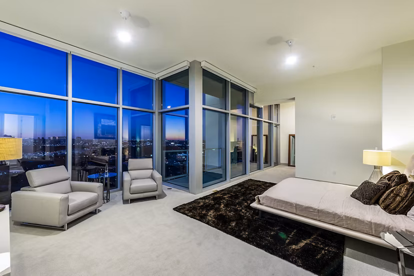 Modern bedroom with sleek furnishings at Latitude Med Center Apartments in Houston