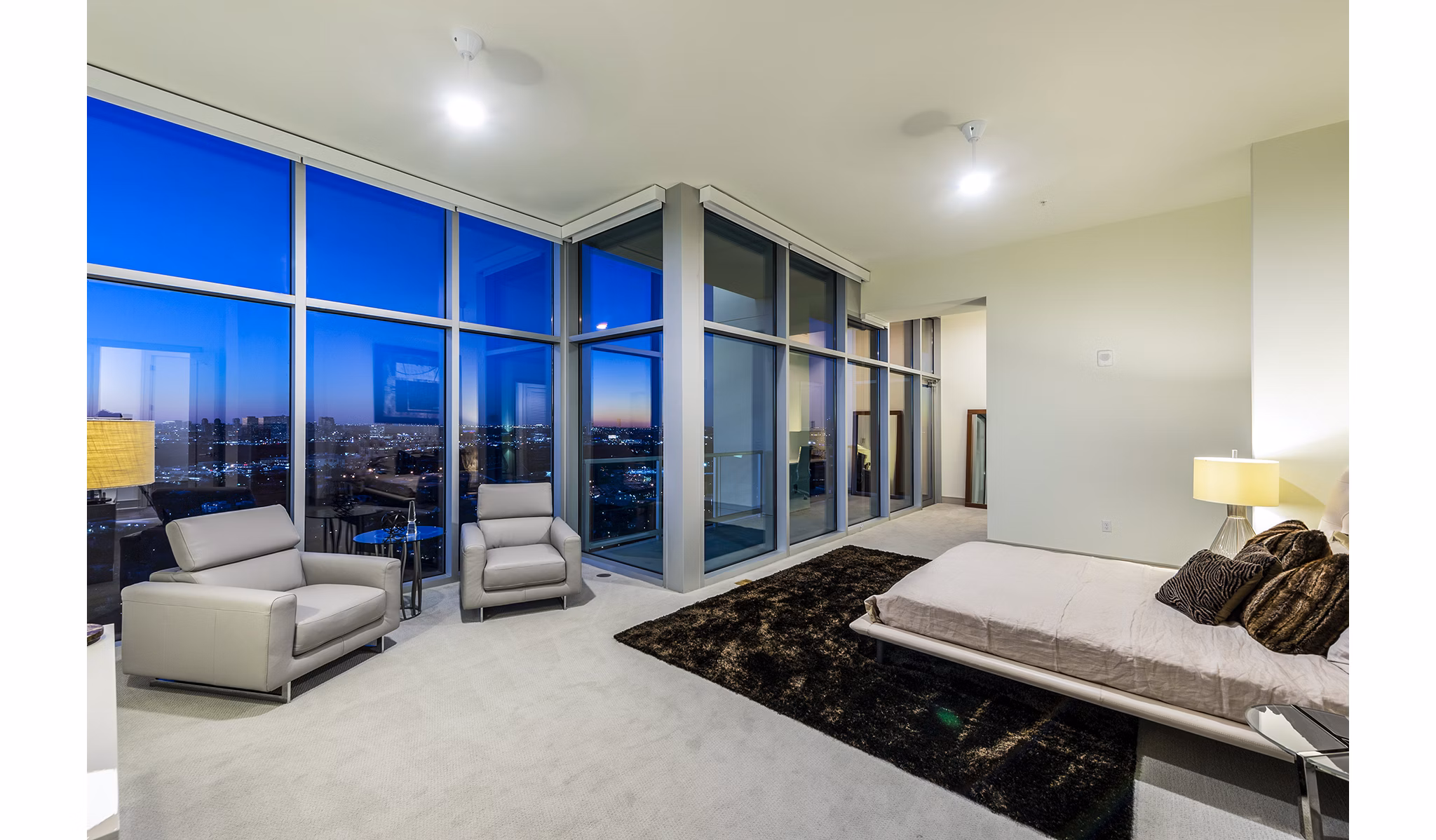 Modern bedroom with sleek furnishings at Latitude Med Center Apartments in Houston