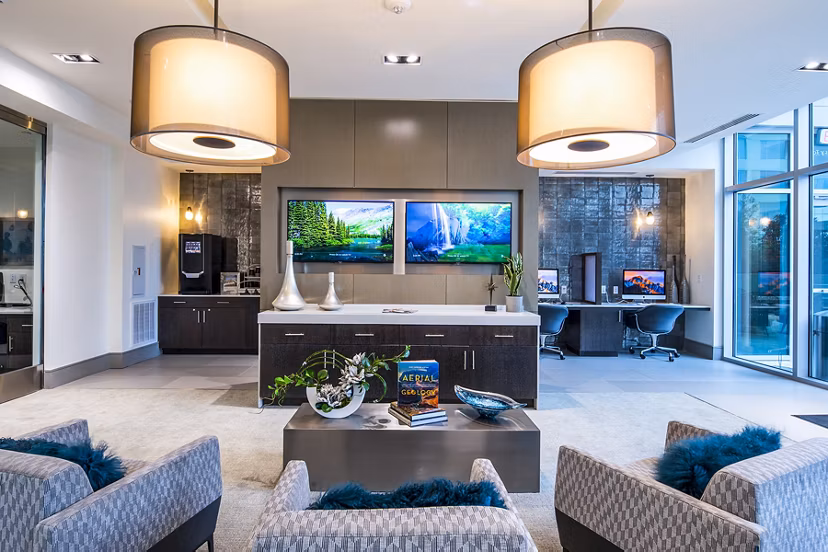 Modern business center with collaborative workspaces at Latitude Med Center Apartments