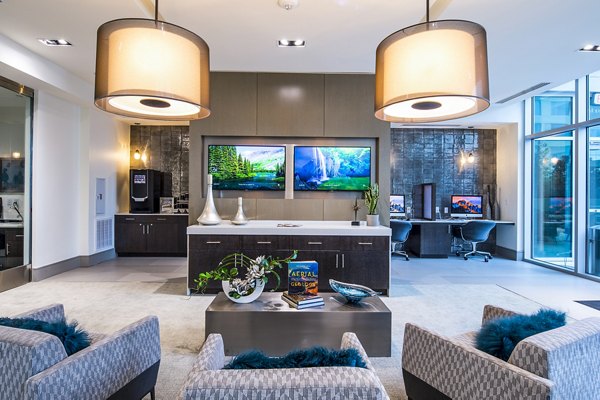 Modern business center with collaborative workspaces at Latitude Med Center Apartments
