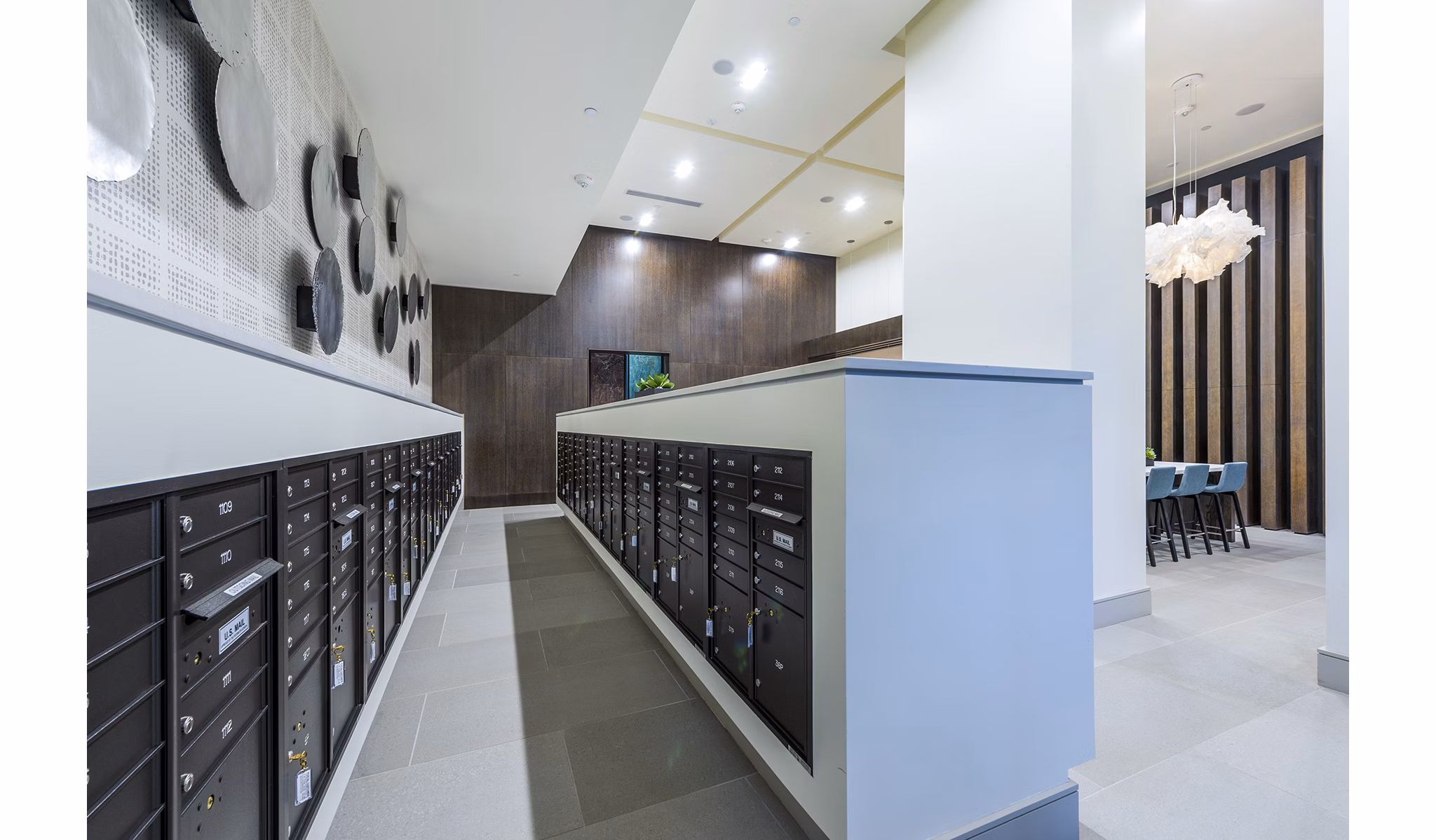 Mailroom with spacious clubhouse at Latitude Med Center Apartments offering modern luxury living in Houston