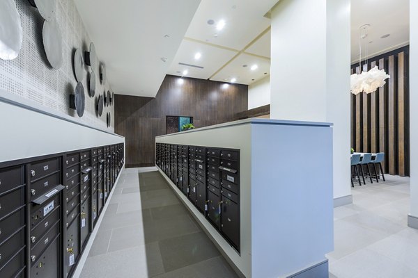 Mailroom with spacious clubhouse at Latitude Med Center Apartments offering modern luxury living in Houston