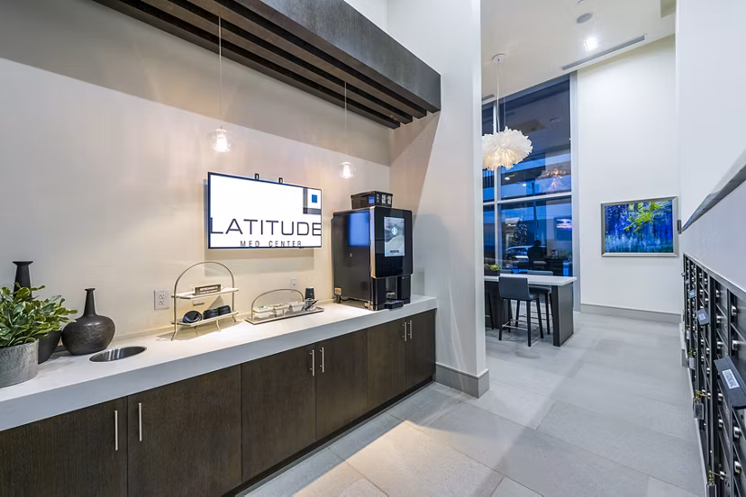 Clubhouse lobby with modern seating and elegant decor at Latitude Med Center Apartments