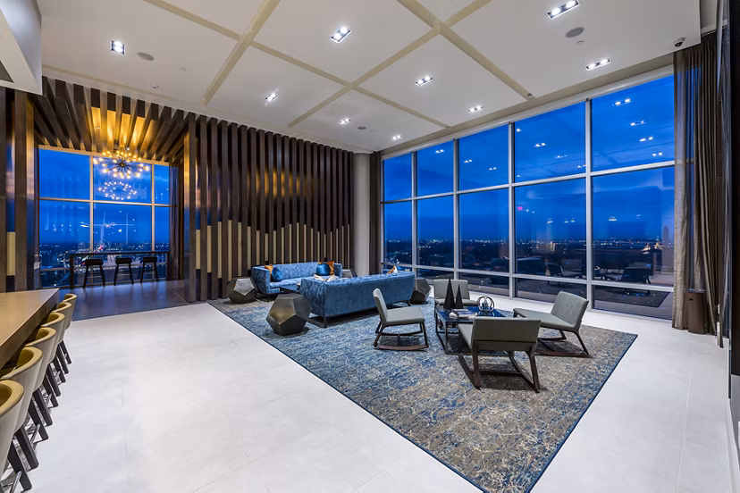 Latitude Med Center Apartments: Modern clubhouse/lounge with cozy seating and stylish decor