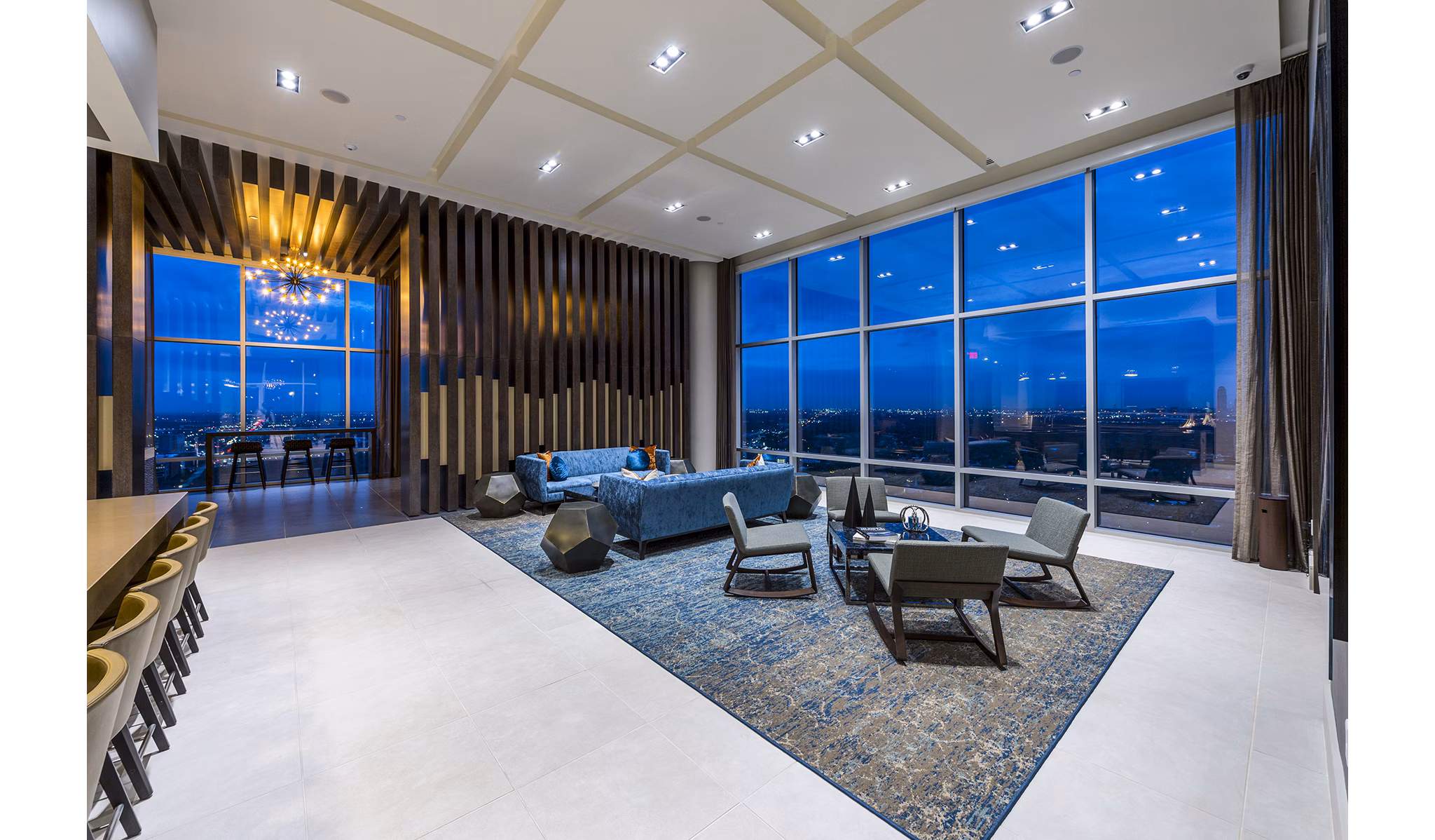 Latitude Med Center Apartments: Modern clubhouse/lounge with cozy seating and stylish decor