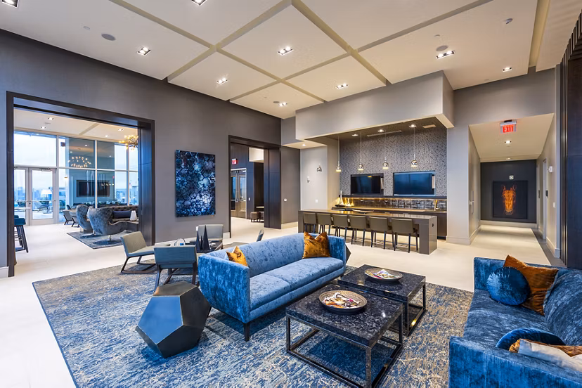 Stylish clubhouse kitchen with modern appliances at Latitude Med Center Apartments, perfect for socializing and entertaining