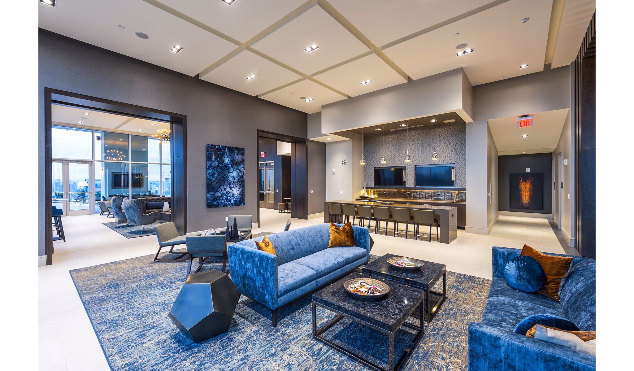 Stylish clubhouse kitchen with modern appliances at Latitude Med Center Apartments, perfect for socializing and entertaining