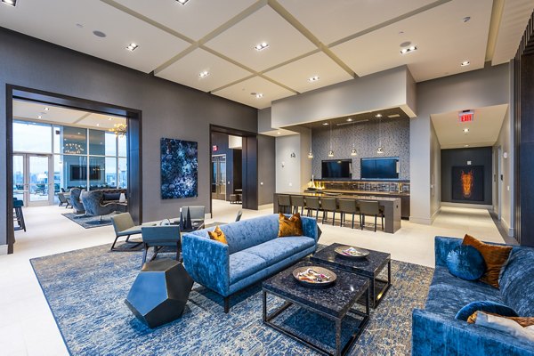 Stylish clubhouse kitchen with modern appliances at Latitude Med Center Apartments, perfect for socializing and entertaining
