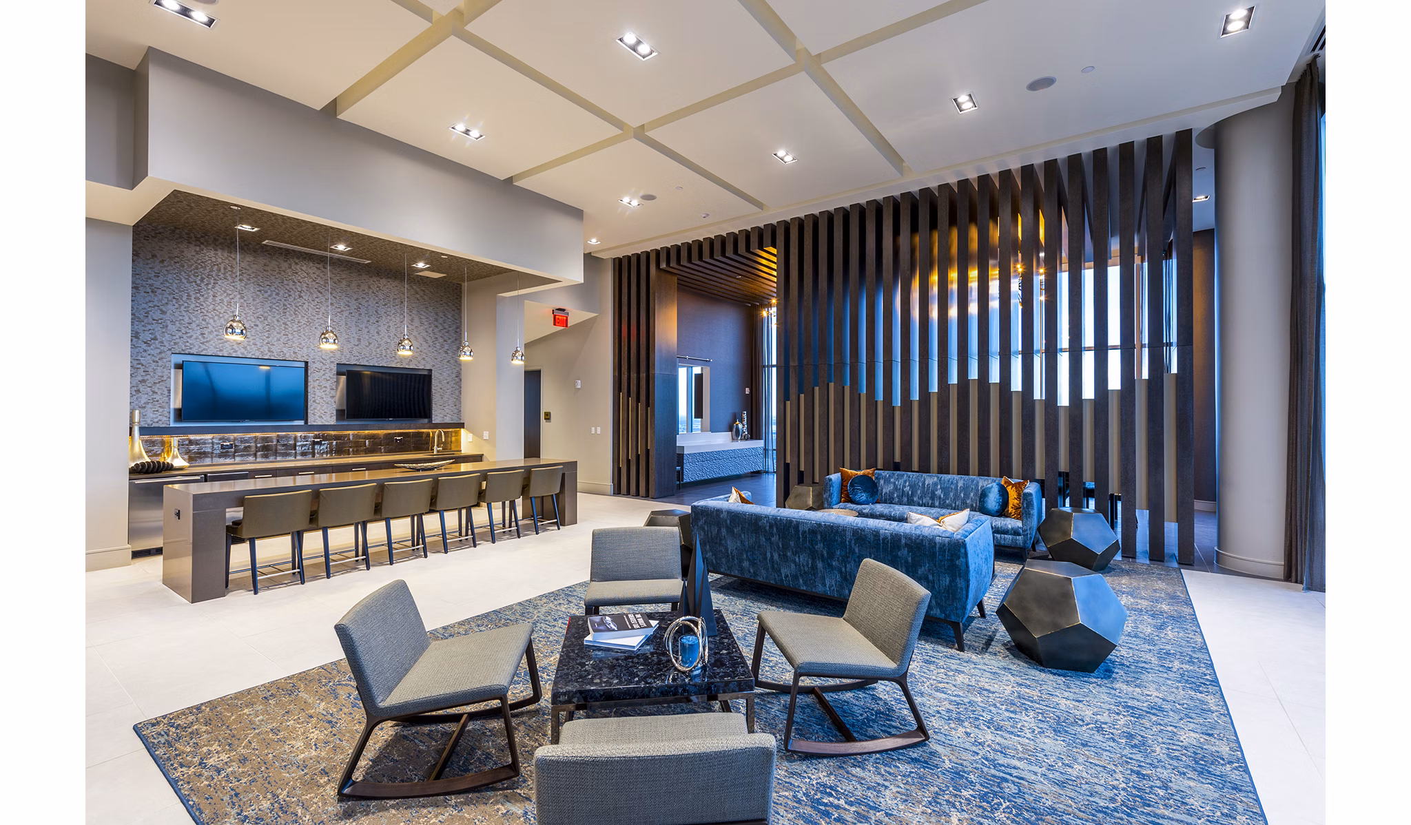 Clubhouse kitchen with stainless steel appliances at Latitude Med Center Apartments, ideal for hosting events in Houstonâ€™s luxury living community