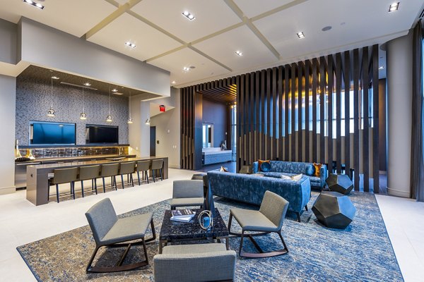 Clubhouse kitchen with stainless steel appliances at Latitude Med Center Apartments, ideal for hosting events in Houstonâ€™s luxury living community